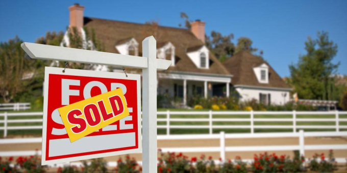 Surging US Housing Markets House With Sold Sign